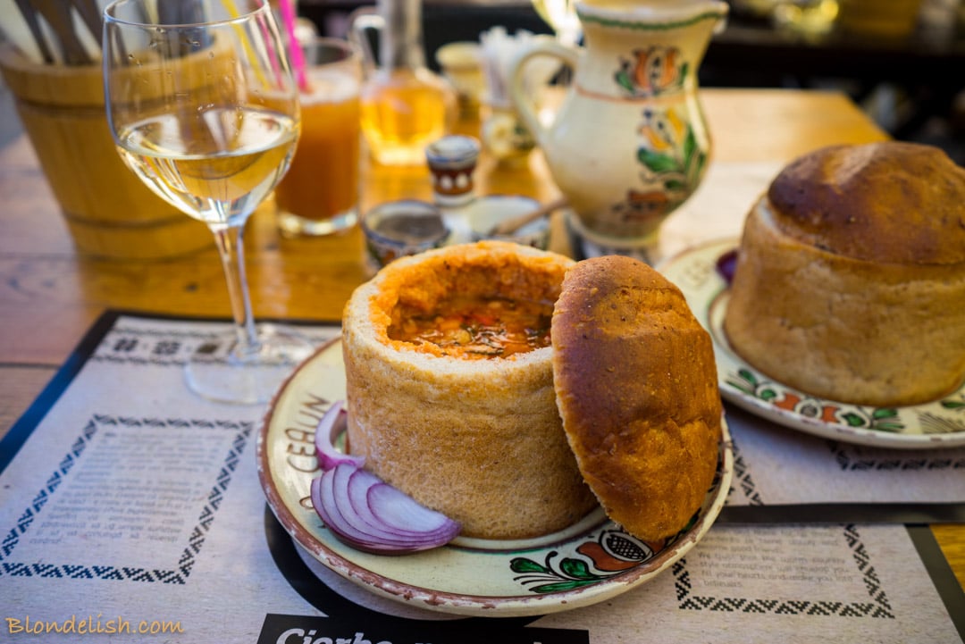 Romanian Beans and smoked pork soup, served in bread