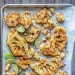 Roasted Cauliflower Steaks with limes in a sheet pan